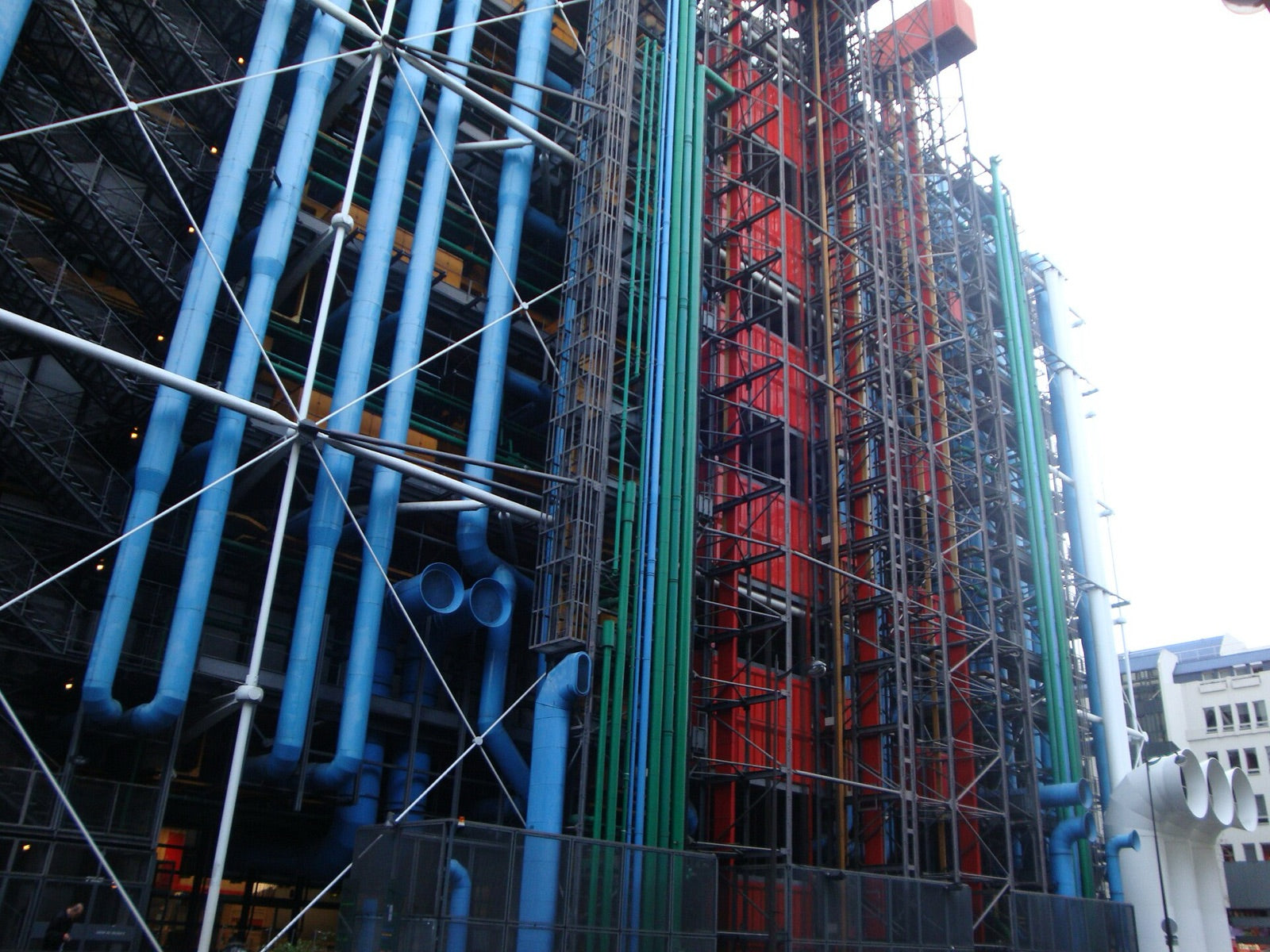 Colour-coded ducts, pipes and external bracing on the east facade of the Centre Pompidou in Paris