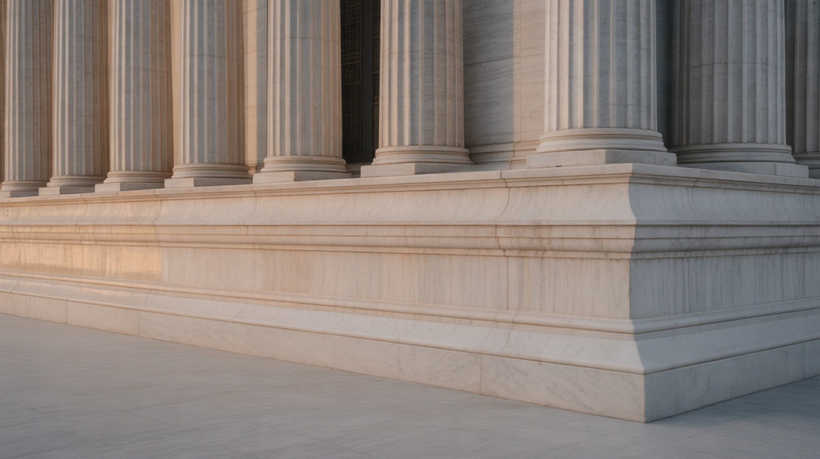 The Golden Ratio in Architecture: close view of a classical stone temple front with fluted columns and a low pediment